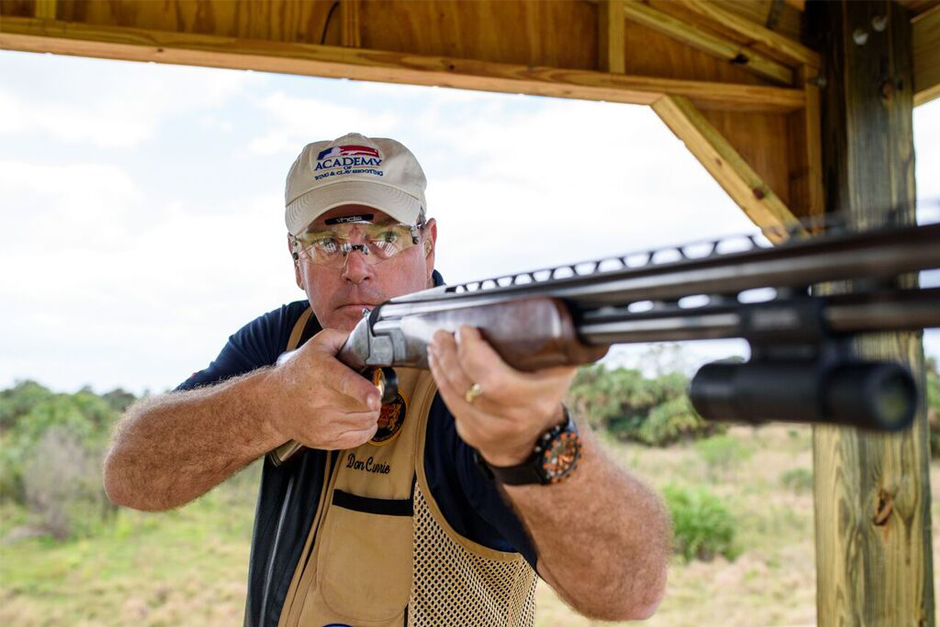 Don Currie demonstrating a shotgun stance during a sporting clays session, offering expert tips for mastering the chandelle in the UK.