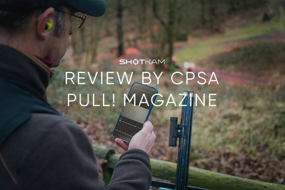 Clay shooter reviews ShotKam footage on a smartphone at a shooting range in the UK, as featured in the CPSA's PULL! Magazine. Perfect tool for analyzing clay shooting techniques.