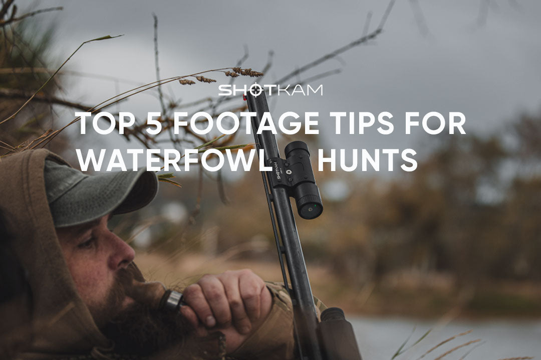 Duck hunter preparing to shoot with a ShotKam camera attached to the barrel