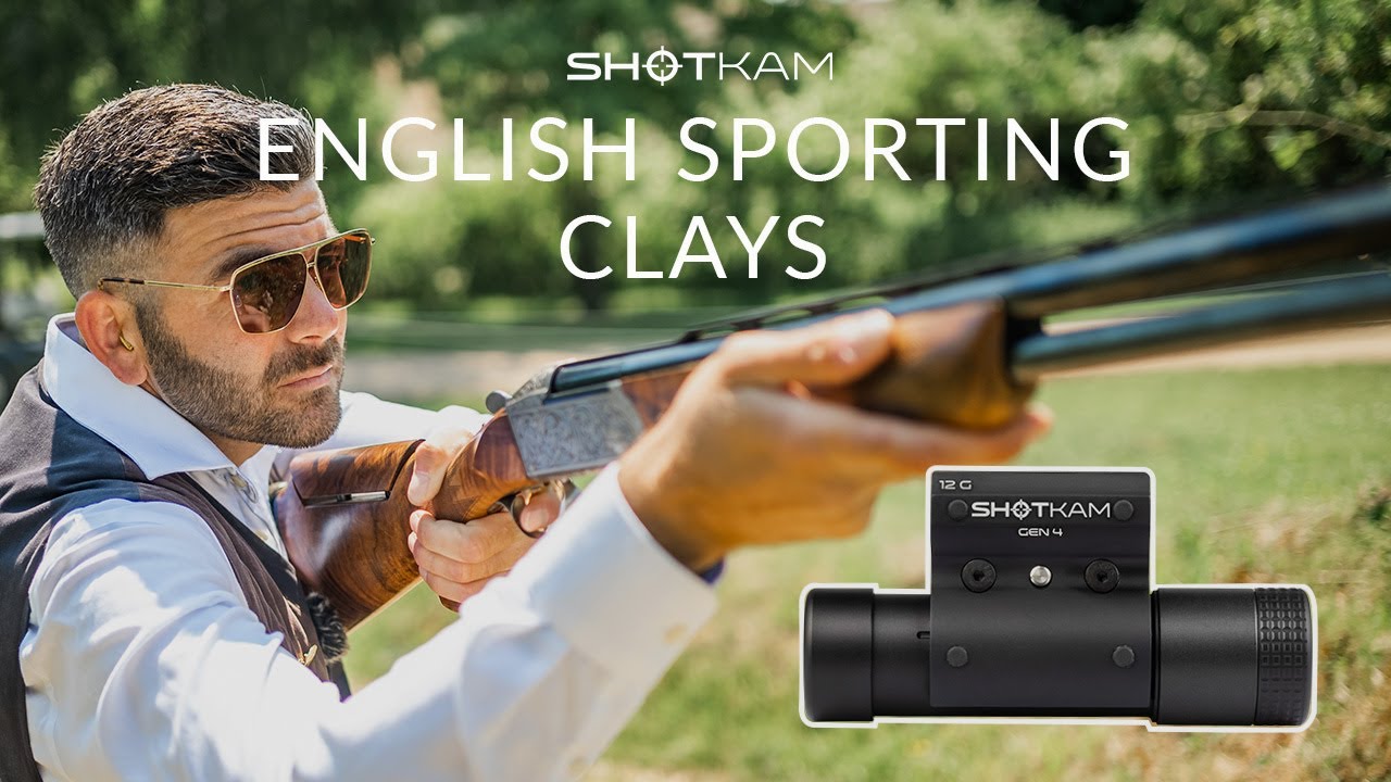 Man aiming shotgun while using ShotKam Gen 4 camera, focusing on English sporting clays shooting.