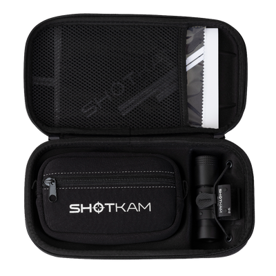 ShotKam Gen 4 Mini camera securely packed in its durable carrying case with a zippered compartment for accessories.